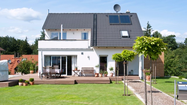 Ein Einfamilienhaus mit Vorgarten Ein Einfamilienhaus mit Vorgarten